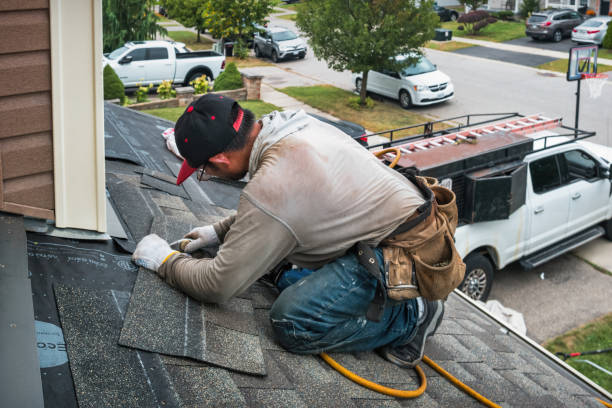 Professional Roof Replacement technician working in Thomaston, NY